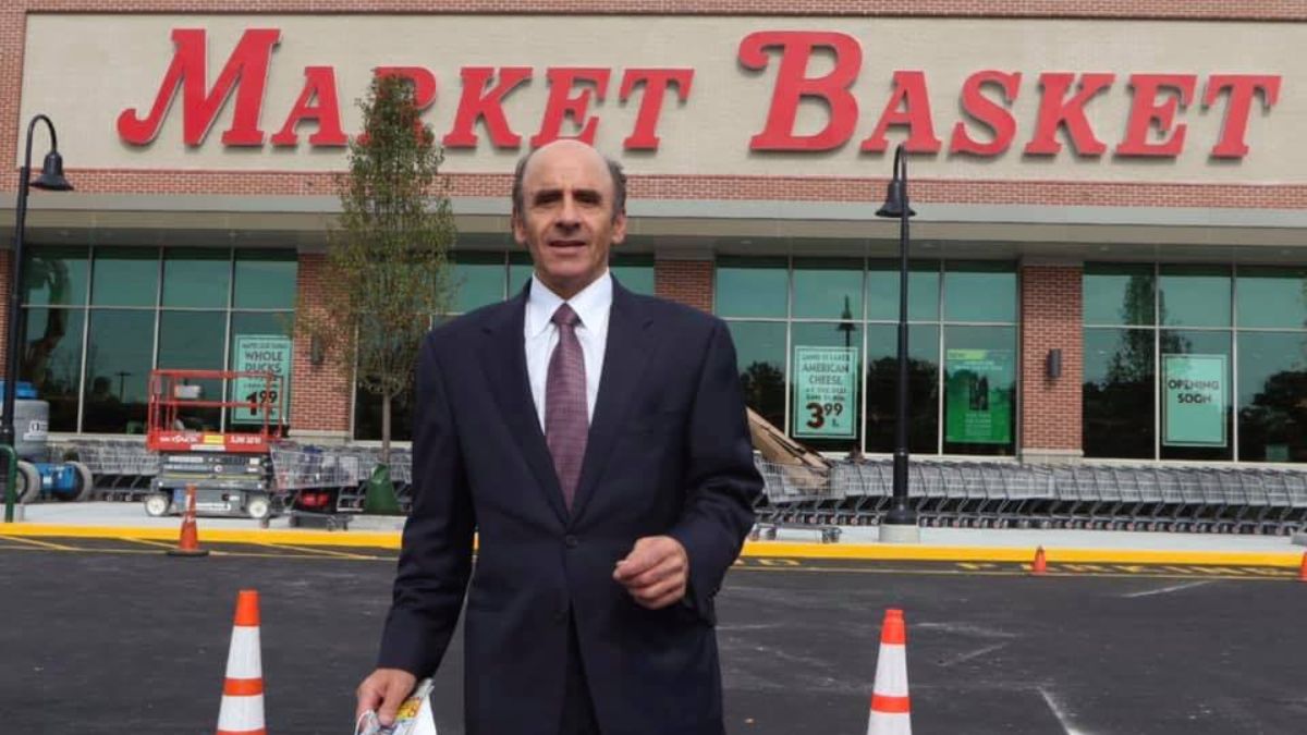 Arthur T. Demoulas stands in front of a Market Basket store