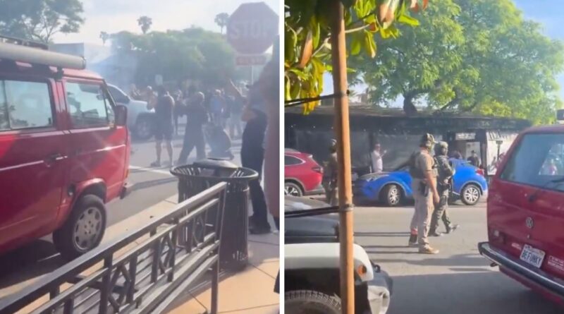 ICE agents conducting a raid at Buona Forchetta in South Park, San Diego.