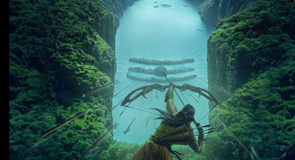 Kannappa aiming his bow at a sacred river surrounded by cliffs forming Shiva’s Trishul symbol