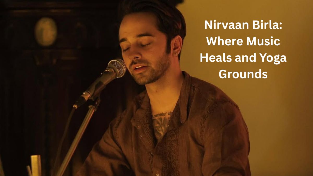Nirvaan Birla singing in a satsang, surrounded by warm candlelight and wearing a traditional kurta.
