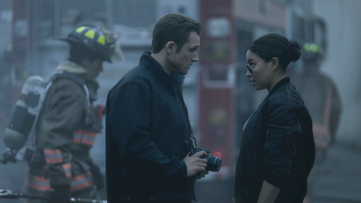 Taron Egerton and Jurnee Smollett in a tense moment from Apple TV+'s Smoke
