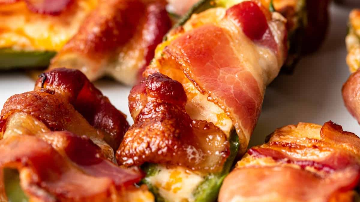 Bacon-wrapped jalapeño poppers with melted cheese and crispy bacon