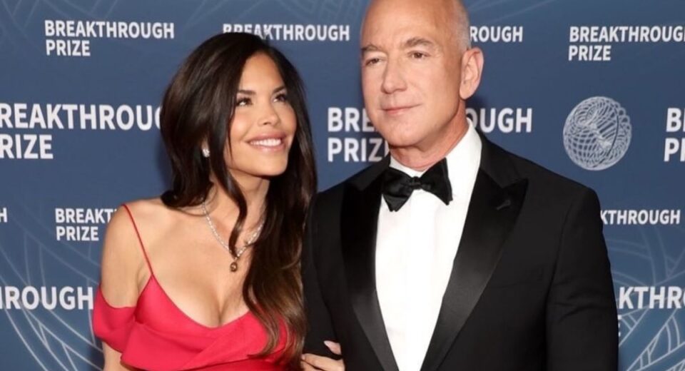 Jeff Bezos and Lauren Sánchez pose together at the Breakthrough Prize event, smiling in formal evening wear