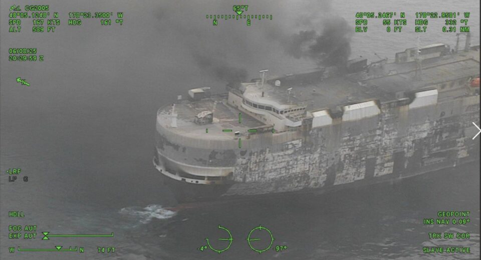 Aerial view of Morning Midas cargo ship emitting smoke in the Pacific Ocean