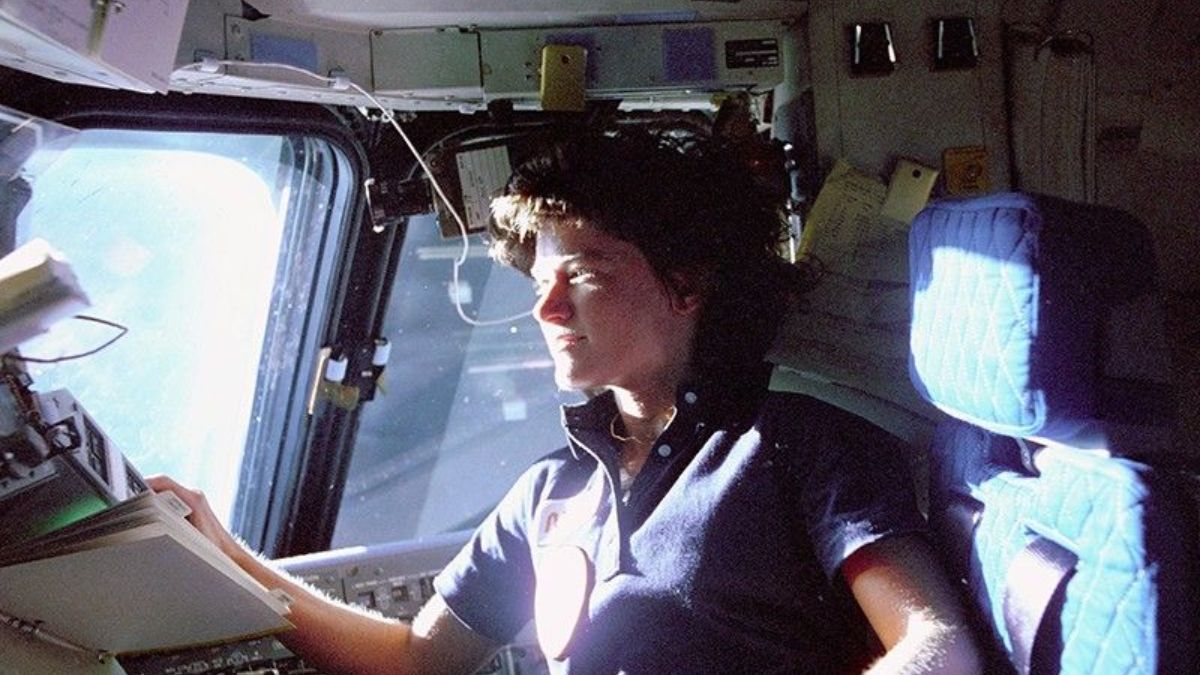 Sally Ride working aboard the space shuttle Challenger