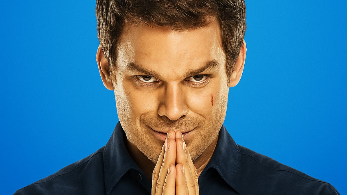 Michael C. Hall as Dexter Morgan in a blue background, smirking with prayer hands
