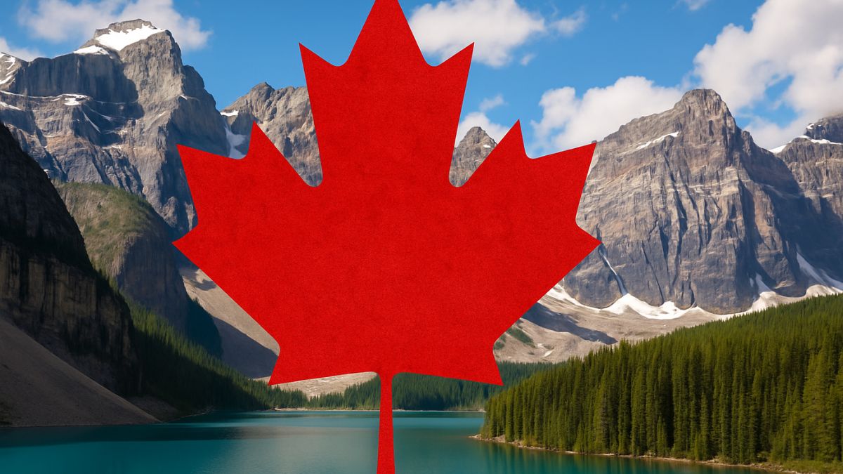 Red maple leaf overlay on a scenic Canadian mountain lake