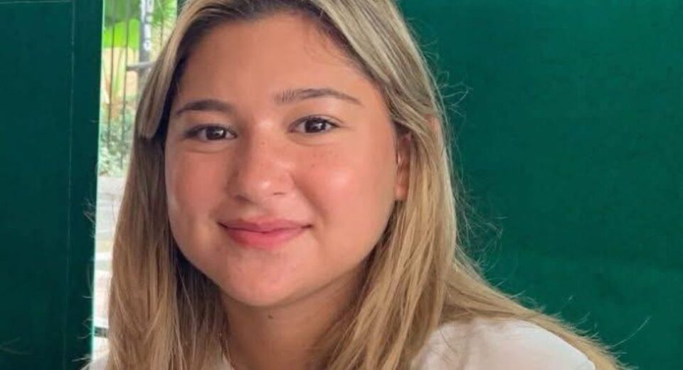 Portrait of Claire Reese Manchaca, a young woman with blonde hair, smiling