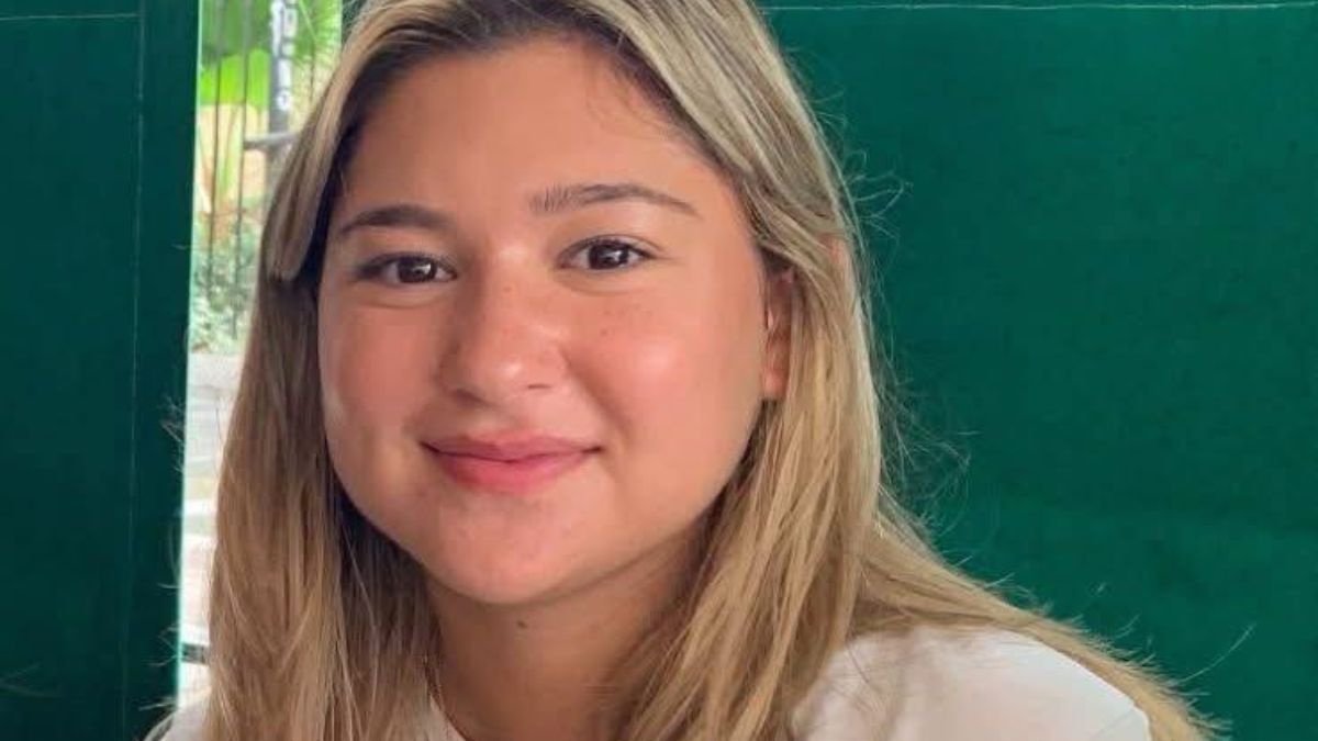Portrait of Claire Reese Manchaca, a young woman with blonde hair, smiling