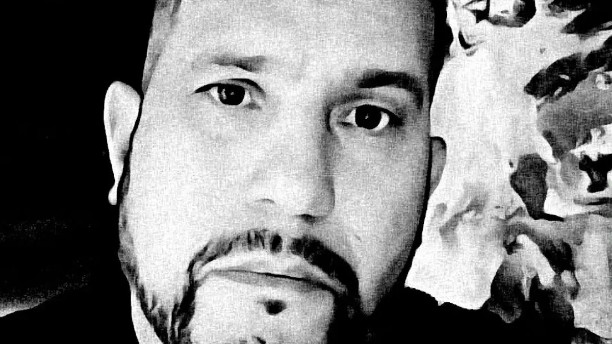 Black-and-white portrait of Dan Rivera, lead paranormal investigator with the Annabelle doll tour
