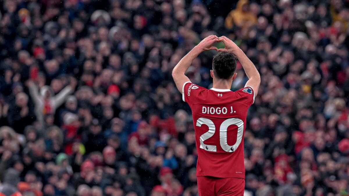 Diogo Jota makes a heart gesture to fans during a Liverpool match