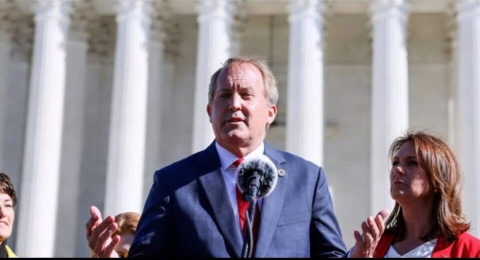 Ken Paxton speaks at a press conference as divorce news breaks