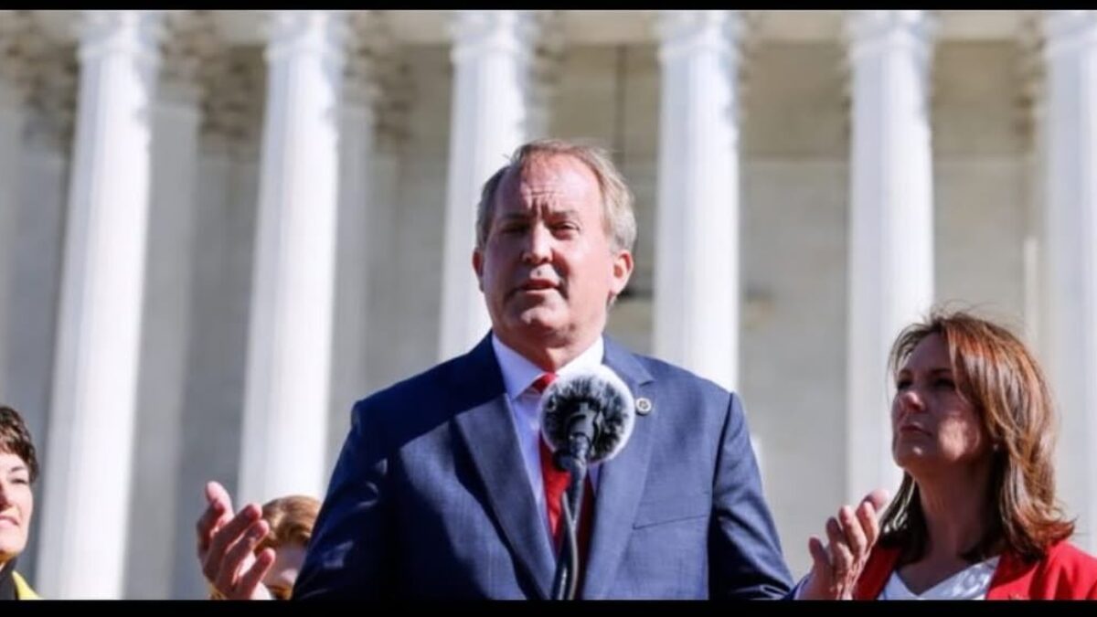 Ken Paxton speaks at a press conference as divorce news breaks