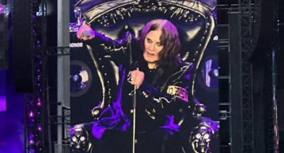 Ozzy Osbourne performs seated on a gothic black throne during Black Sabbath’s final concert