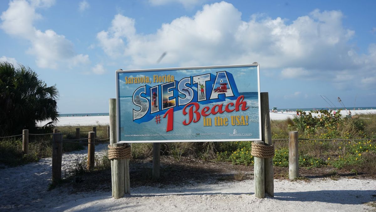 Signboard for Siesta Beach in Sarasota, Florida ranked #1 beach in the USA
