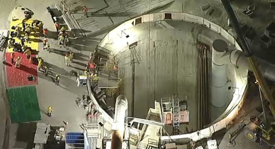 Firefighters and rescue workers at the Wilmington tunnel collapse site in Los Angeles