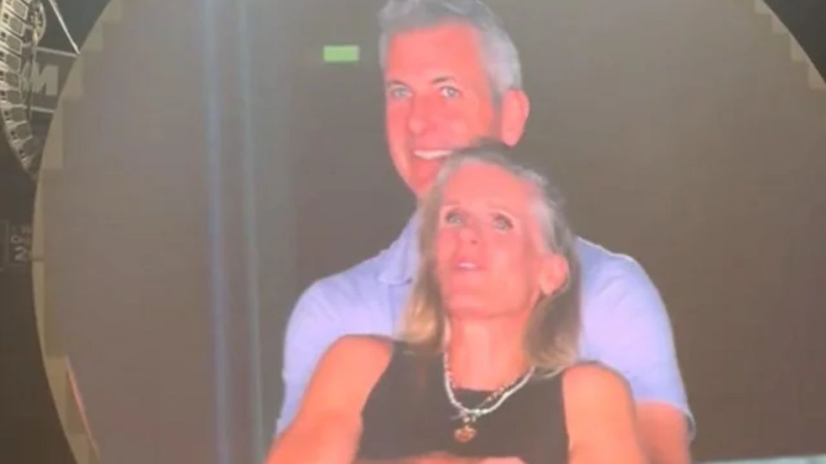 Coldplay kiss cam couple ducking at Boston concert