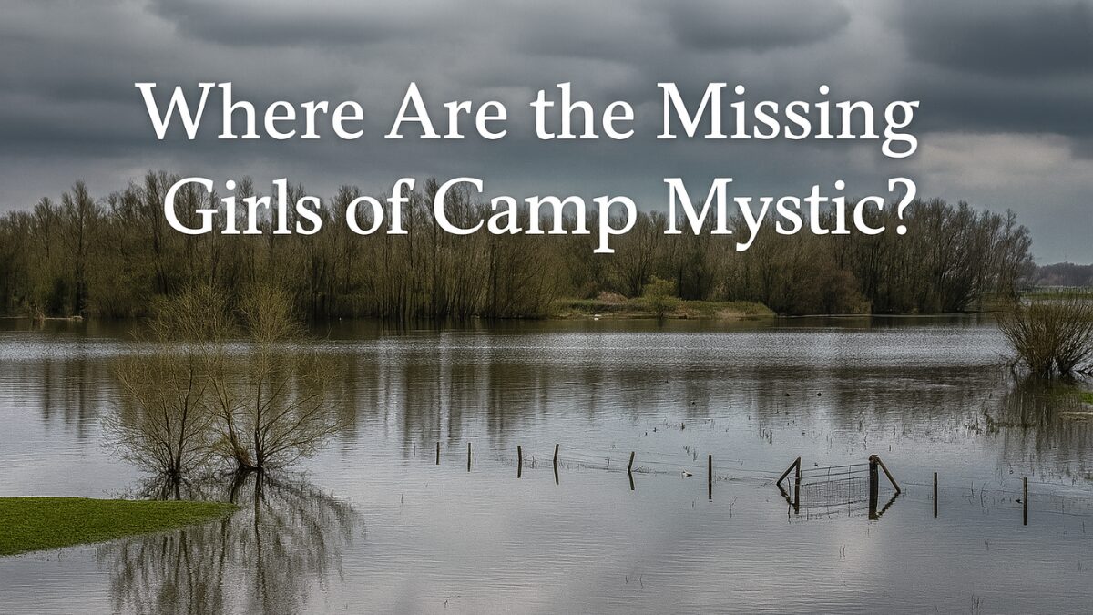 Flooded riverbank with broken fence and trees submerged under water, storm clouds overhead — symbolizing Camp Mystic flood.